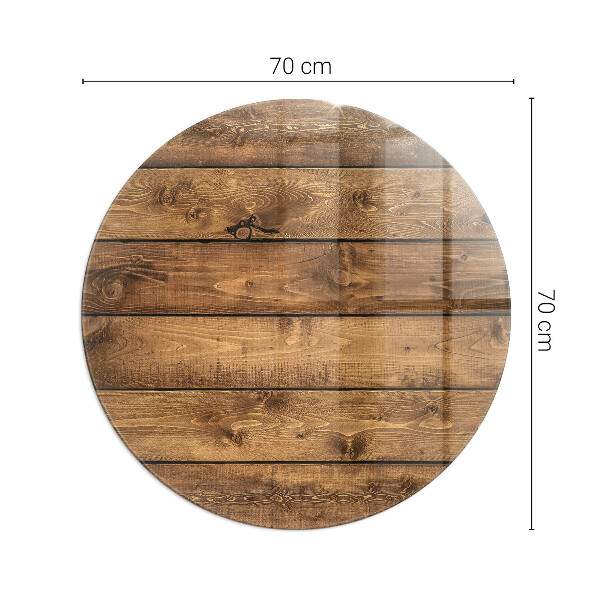 Round glass fire hearth Wooden board with grain