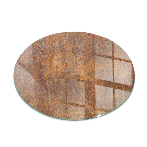 Round glass fire hearth Rust texture on the background