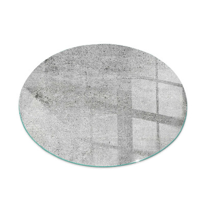 Round glass hearths for wood burners Raw concrete texture
