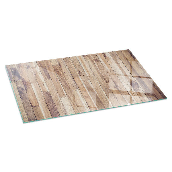 Rectangular glass hearth for wood stove Wooden board in the layout