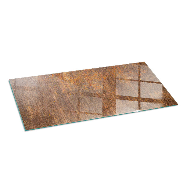 Rectangular glass hearth for log burner Rust texture on metal