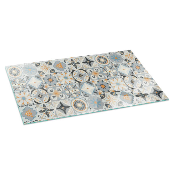 Rectangular glass hearth for log burner Mosaic patterns in tiles