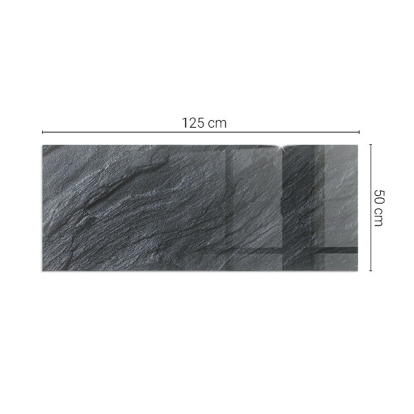 Rectangular glass hearth for log burner Stone surface texture
