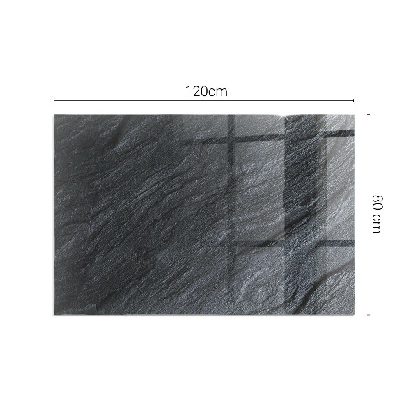 Rectangular glass hearth for log burner Stone surface texture