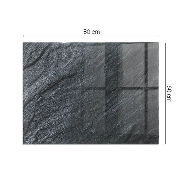 Rectangular glass hearth for log burner Stone surface texture