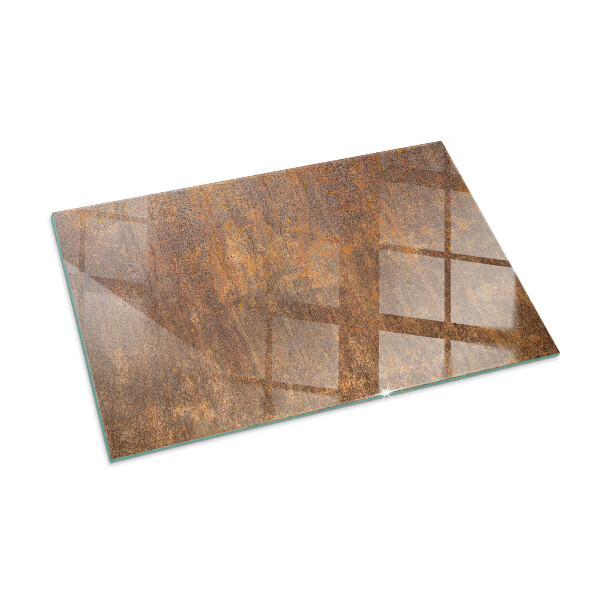 Rectangular glass hearth for log burner Rust texture on the background