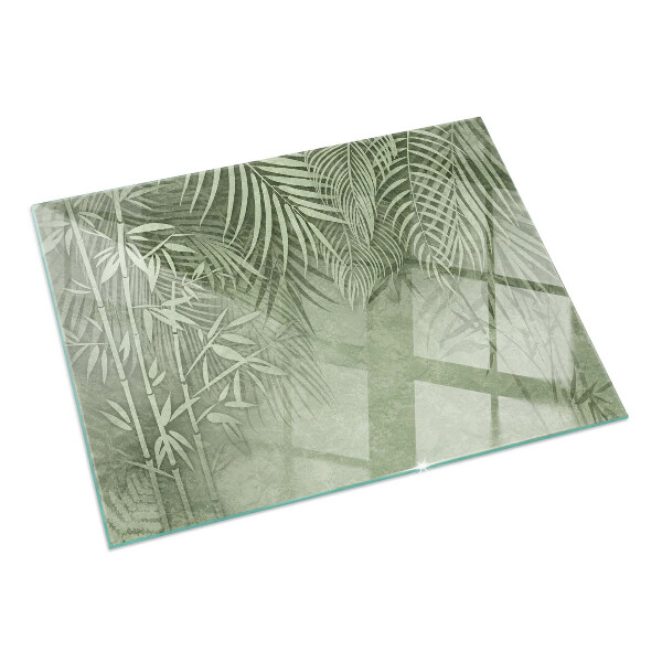 Rectangular glass hearth Tropical leaves in the background
