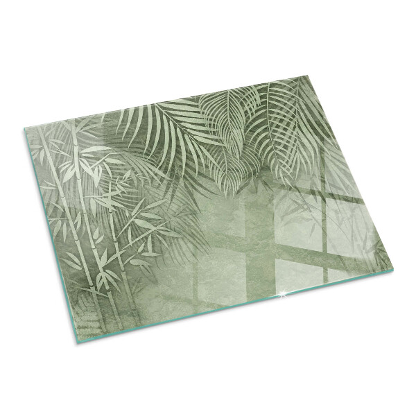 Rectangular glass hearth Tropical leaves in the background
