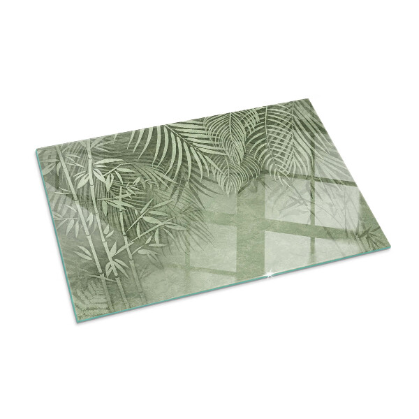 Rectangular glass hearth Tropical leaves in the background