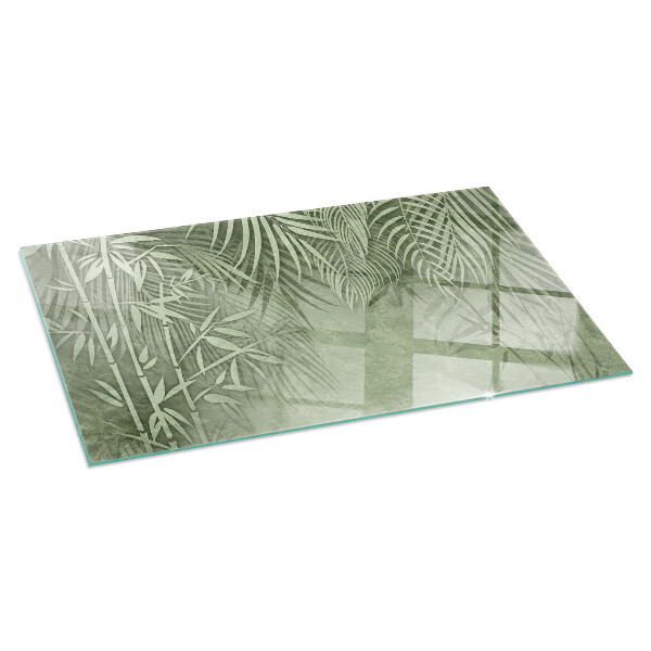 Rectangular glass hearth Tropical leaves in the background