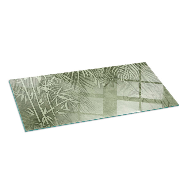 Rectangular glass hearth Tropical leaves in the background