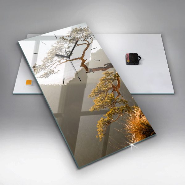 Vertical wall clock A tree in the mountains
