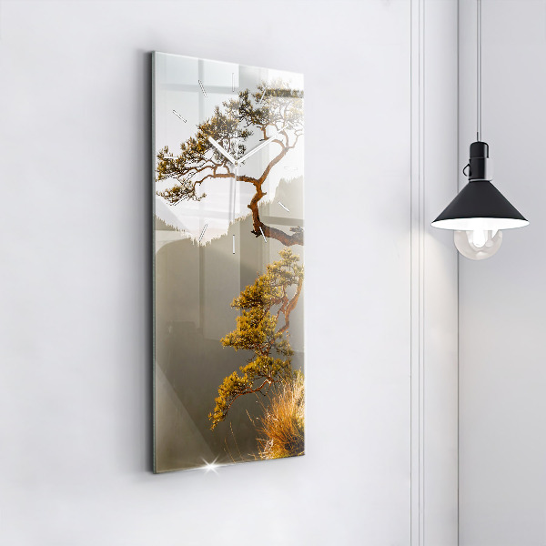 Vertical wall clock A tree in the mountains