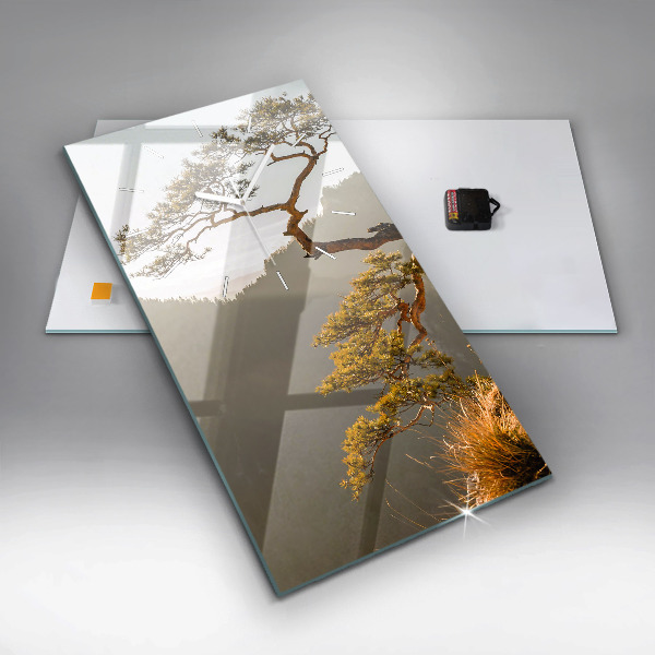 Vertical wall clock A tree in the mountains