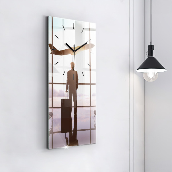 Vertical wall clock Man at the airport