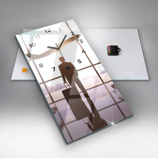 Vertical wall clock Man at the airport