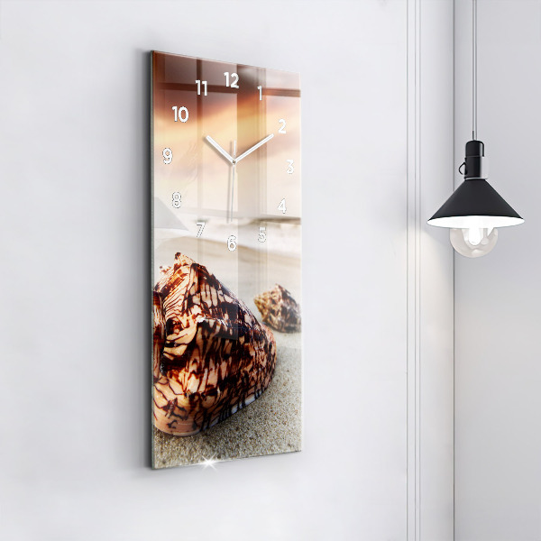 Vertical wall clock A shell on the beach