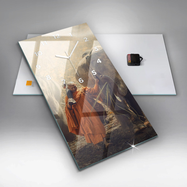 Vertical wall clock Monk leading elephants
