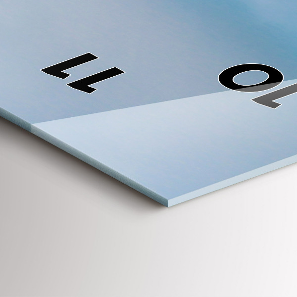 Vertical wall clock Giraffe head against the sky