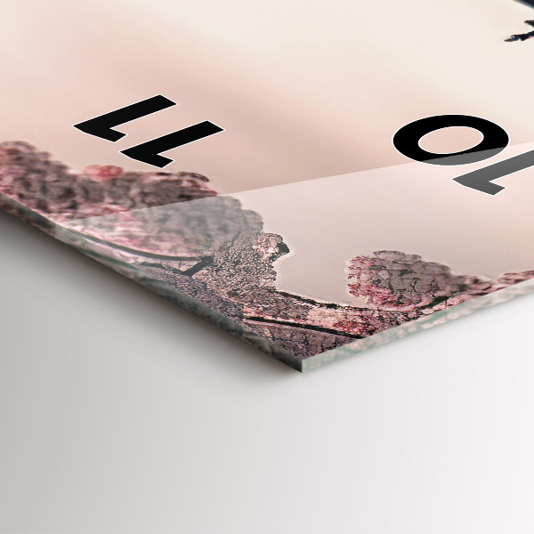 Vertical wall clock Tower and flowers in Asia