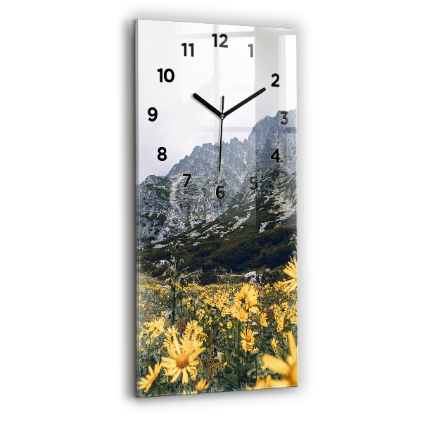 Vertical wall clock Meadow flowers in the mountains