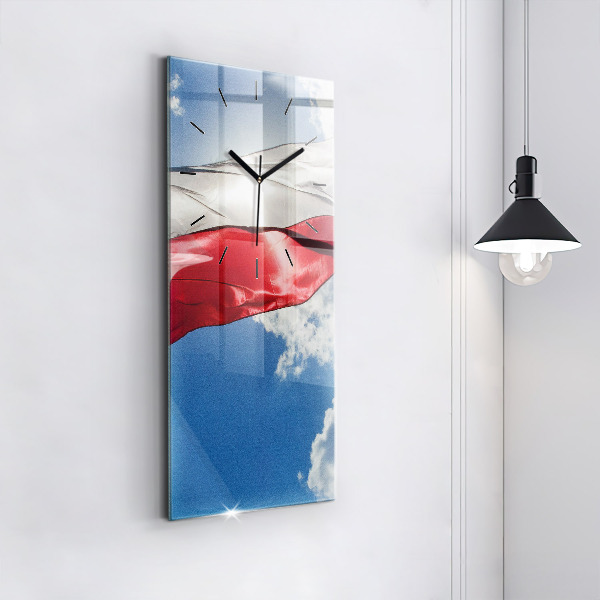 Vertical wall clock The Polish flag against the sky
