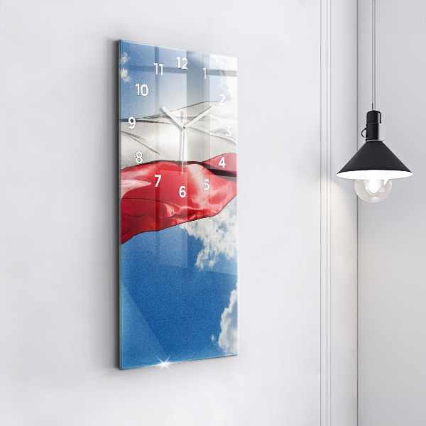 Vertical wall clock The Polish flag against the sky