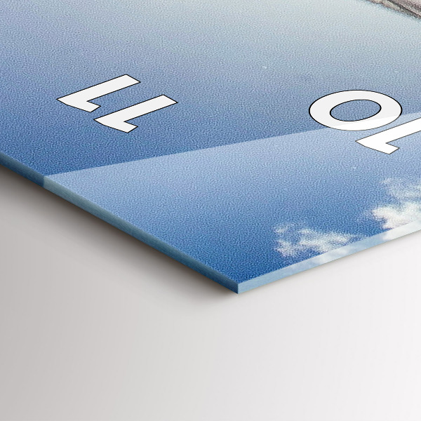 Vertical wall clock The Polish flag against the sky