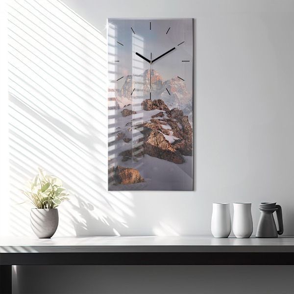 Vertical wall clock A mountain covered in snow