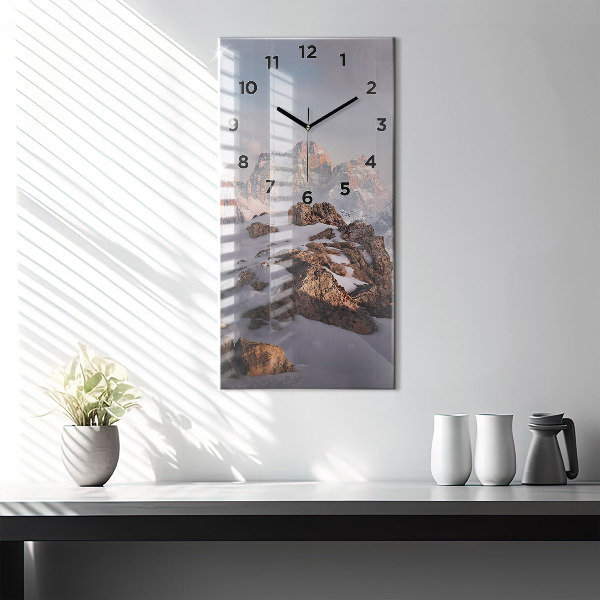 Vertical wall clock A mountain covered in snow
