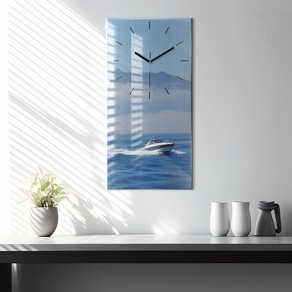 Vertical wall clock A boat floating on the ocean
