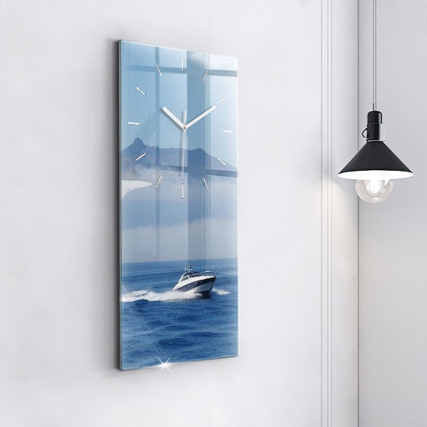 Vertical wall clock A boat floating on the ocean