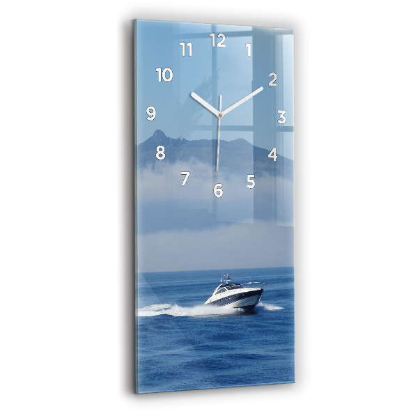 Vertical wall clock A boat floating on the ocean