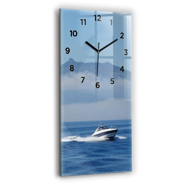 Vertical wall clock A boat floating on the ocean