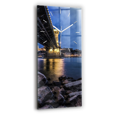 Vertical wall clock Rocky shore under the bridge