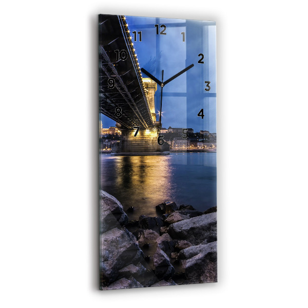 Vertical wall clock Rocky shore under the bridge
