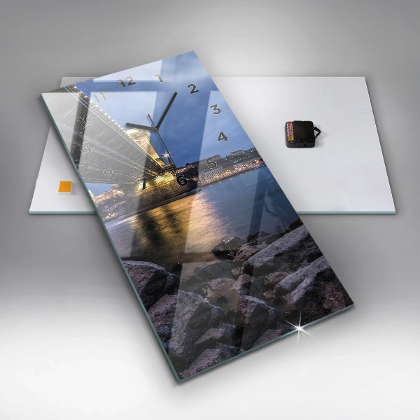 Vertical wall clock Rocky shore under the bridge