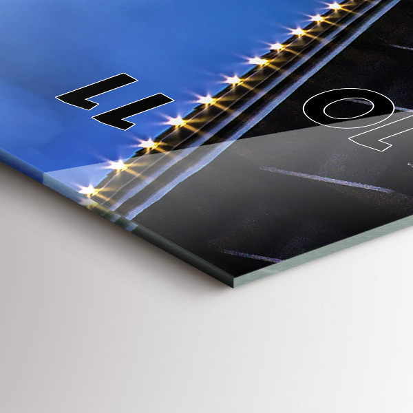 Vertical wall clock Rocky shore under the bridge