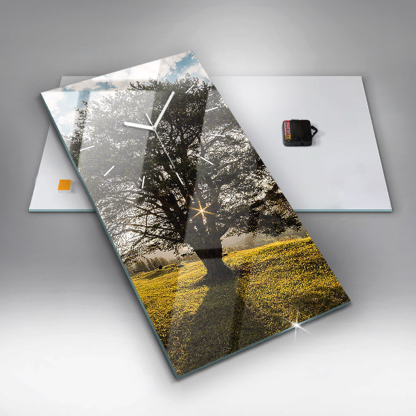 Vertical wall clock A tree on a hill