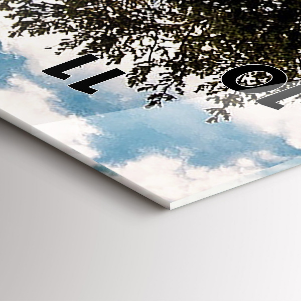 Vertical wall clock A tree on a hill