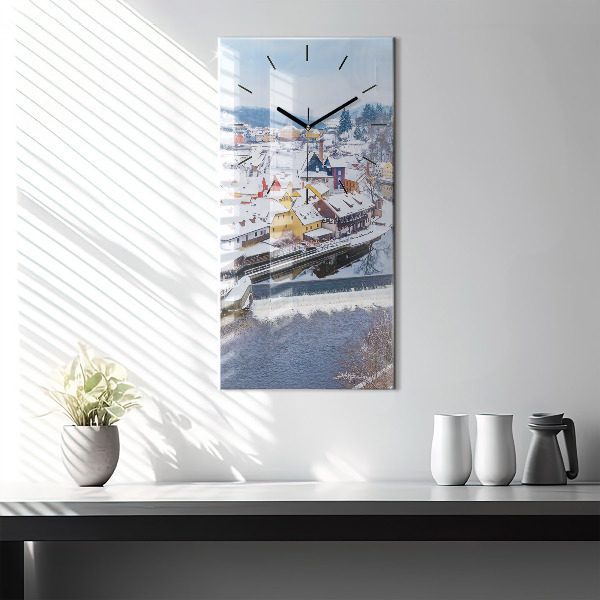 Vertical wall clock Panorama of the city in winter