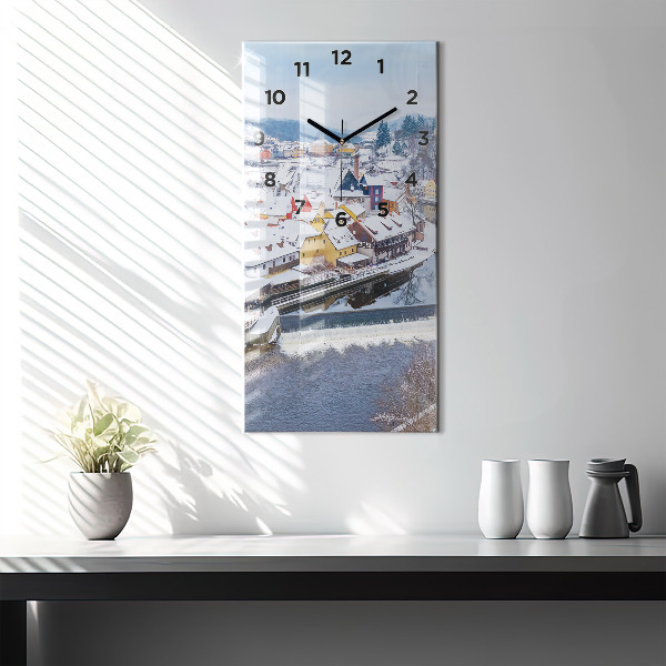Vertical wall clock Panorama of the city in winter