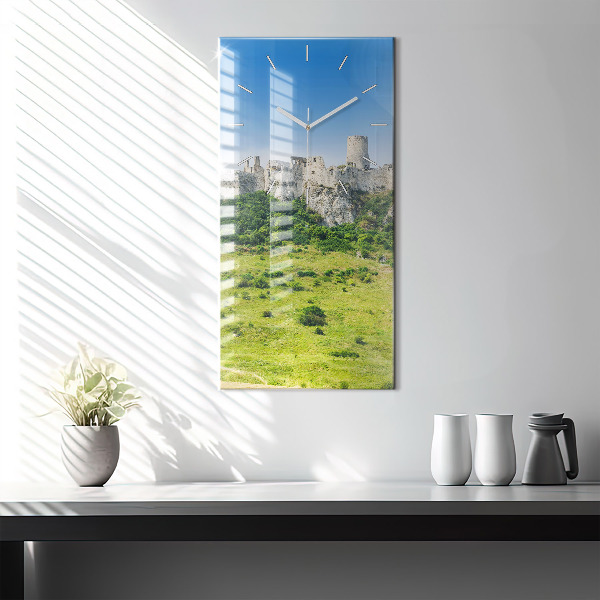 Vertical wall clock Spiš Castle in Slovakia