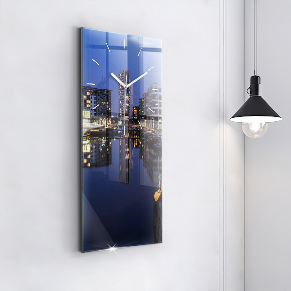 Vertical wall clock The city lit up at night