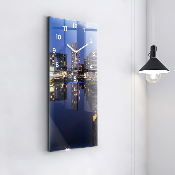 Vertical wall clock The city lit up at night