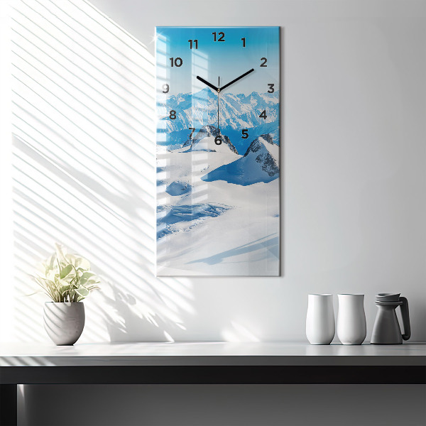 Vertical wall clock Skier in the Alps