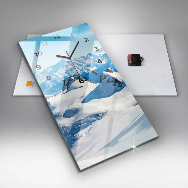 Vertical wall clock Skier in the Alps