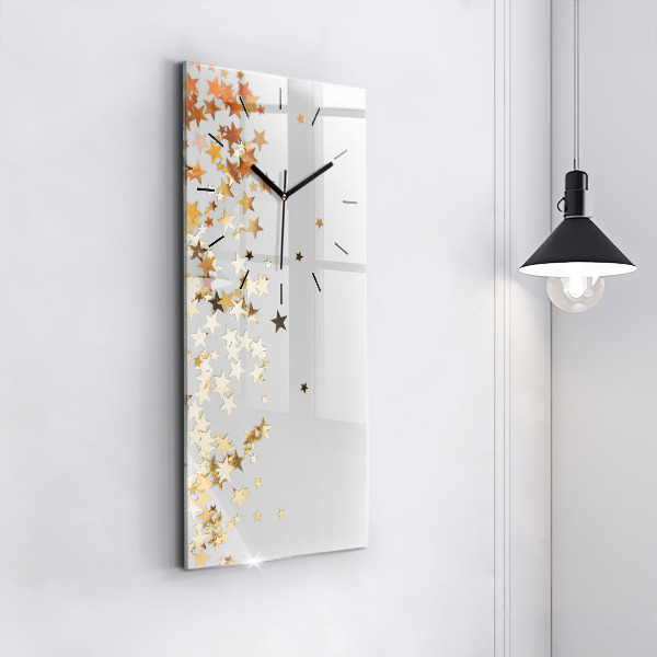 Vertical wall clock Stars on a light background