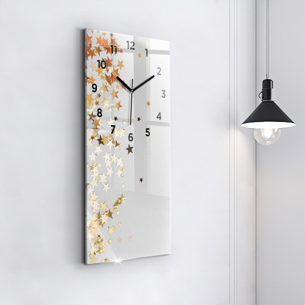 Vertical wall clock Stars on a light background