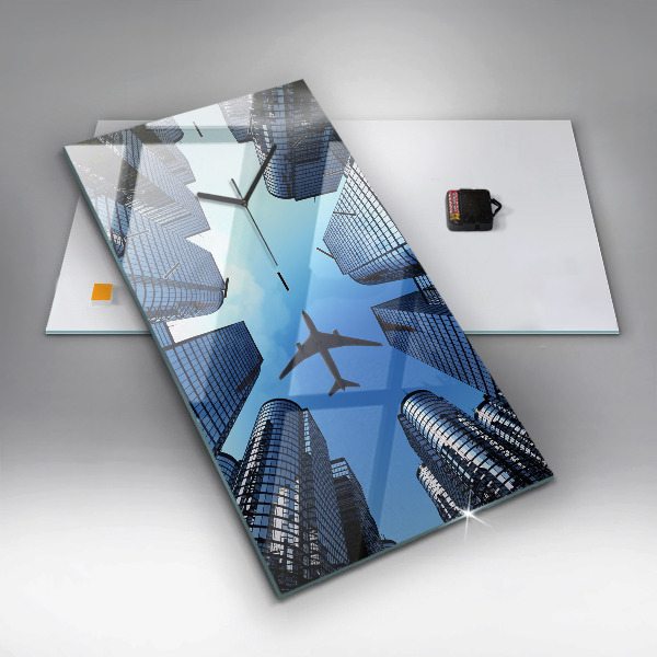 Vertical wall clock Airplane over buildings